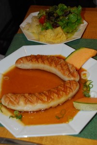 Tender brats with a light sauce and salad at the Herrenmuehle near Adelberg