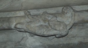 A stone chameleon above the entrance to the storage room for bodies before they were taken to be buried