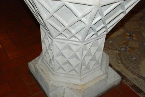 The 13th century font shows a three-sided triangle for the Holy Trinity and a four-sided triangle to represent the Four Elements of Fire, Air, Water and Earth