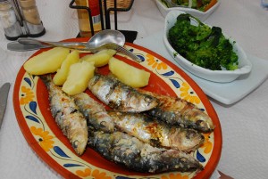 Grilled sardines seaside at the end of the road, 1,855 kilometers after leaving Stuttgart