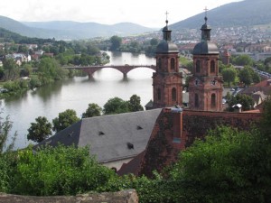 The view over the Main River and twin towers of St. Jakob Church