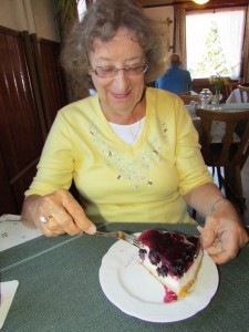 Gloria loves desserts and Germany does these very well! Here she is about to enjoy a slice of homemade blackberry cheese cake in a Gasthaus in the Black Forest