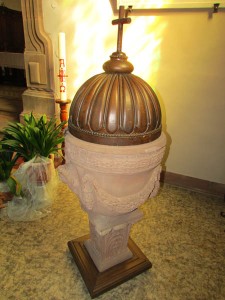 The baptismal font in the church. 