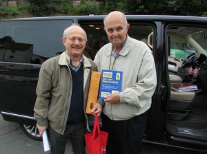 Reinhard Bauerfeind, left, and Ken Temple. Ken had just been presented with a complimentary copy of the town history, co-authored by Bauerfeind. 