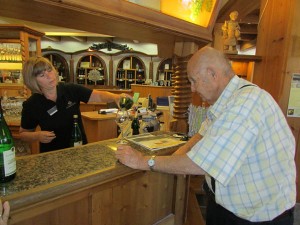 Ken Temple tastes a Muller Thurgau white wine in the Wine Cooperative's showroom in Durbach