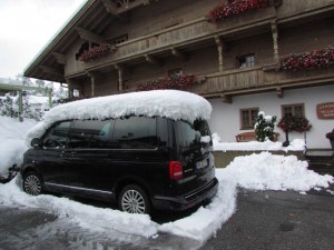 Surprise! We woke to more than ten inches of fresh snow on top of everything, including our touring van